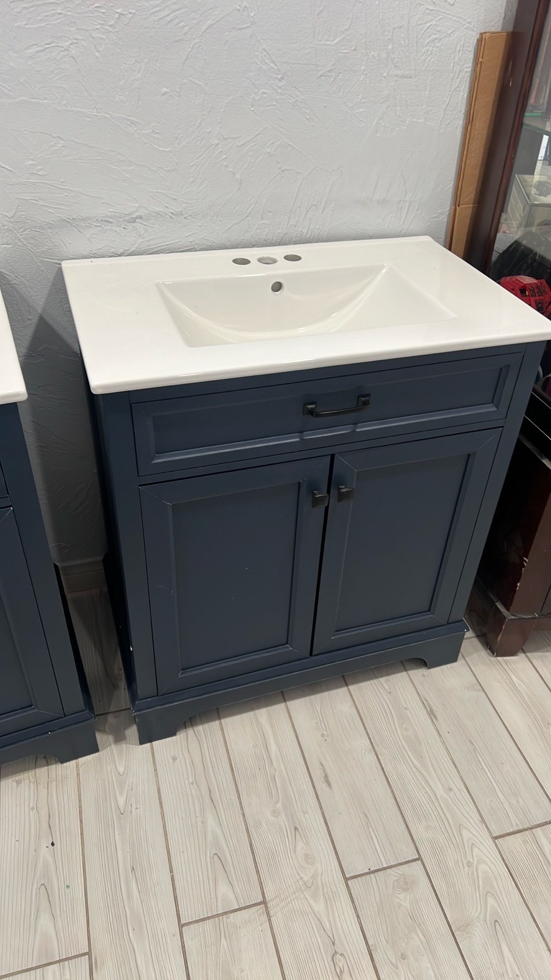Bathroom sink and cabinet
