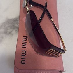 Sunglasses  miu miu