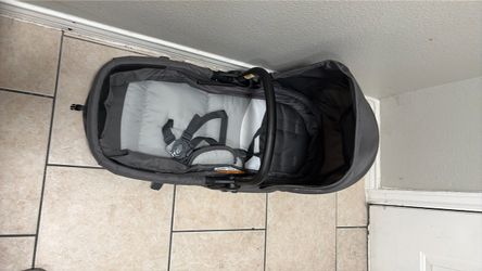 Gray Baby Stroller with Canopy and Harness