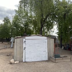 Used Exterior Metal Storage Shed with Wood Door