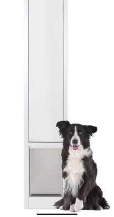 NEW PetSafe Pet Door for Sliding Glass, Size Large, Dogs up to 100lbs, Adjustable Height 75 7/8-81". Retail price is $179.99.