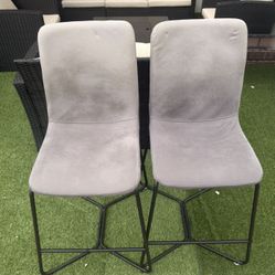 Selling 2 gray stools.