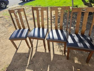4 wooden strong chairs. $60 for all of them