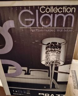 Bazz Lighting Topaz Series Glam wall sconce in a chrome finish.