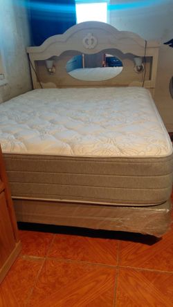 Bed with headboard