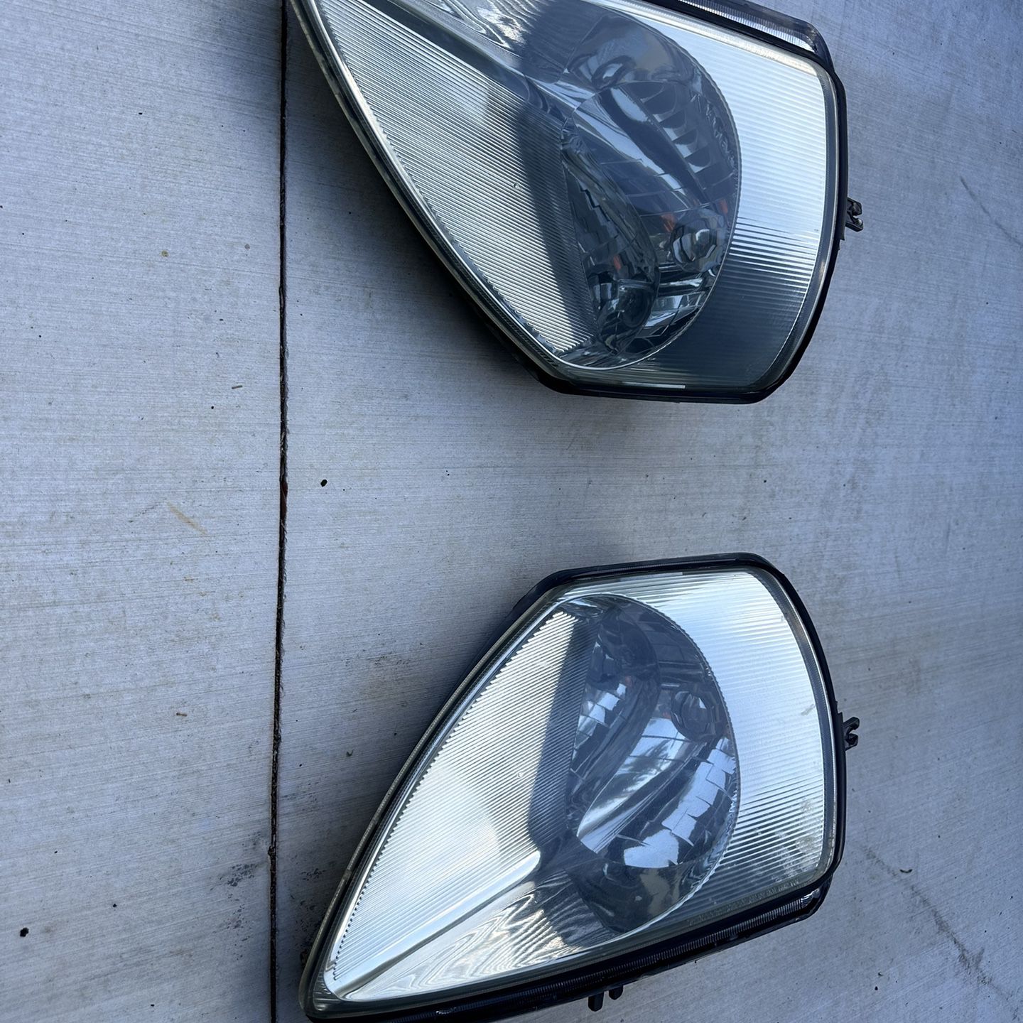 Used Headlights For A 2003 Mitsubishi Eclipse Spider