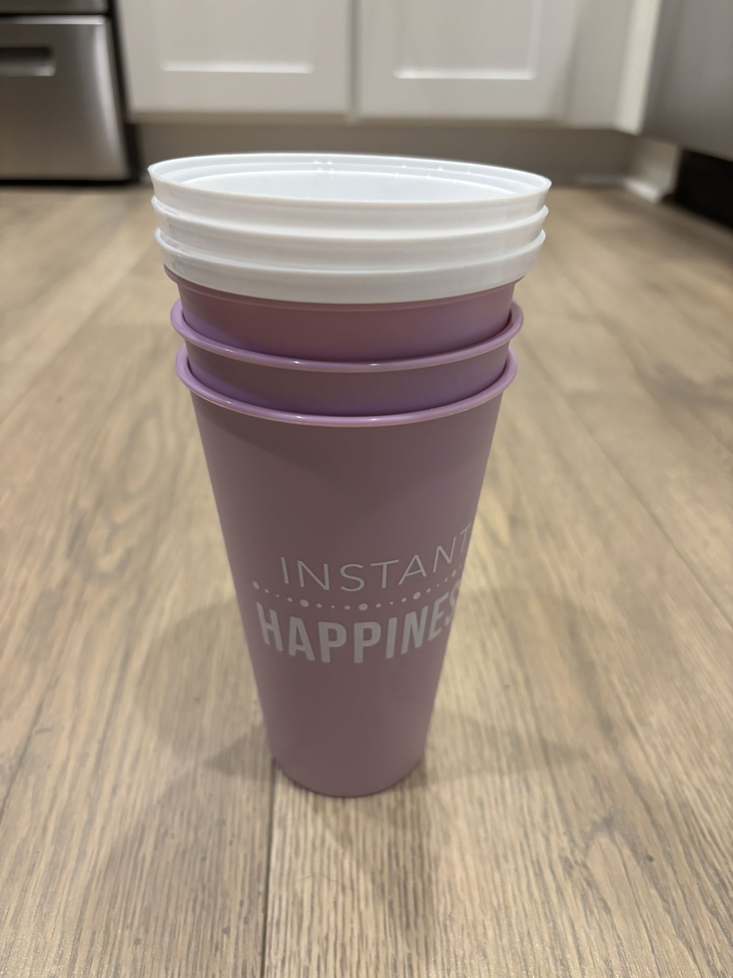 Trio Of Travel Coffee Cups With Coffee Beans