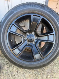Single 2022 Dodge Ram rim & tire P275/50R20 H113