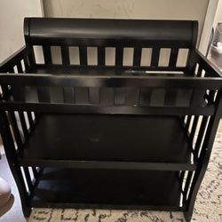 Black Changing Table And White Pad 