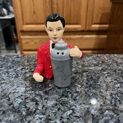 Vintage Ceramic Waiter with a bottle of champagne pair of Salt and Pepper Shakers.  Size approximately 4 inches tall.  Brand new never used.  