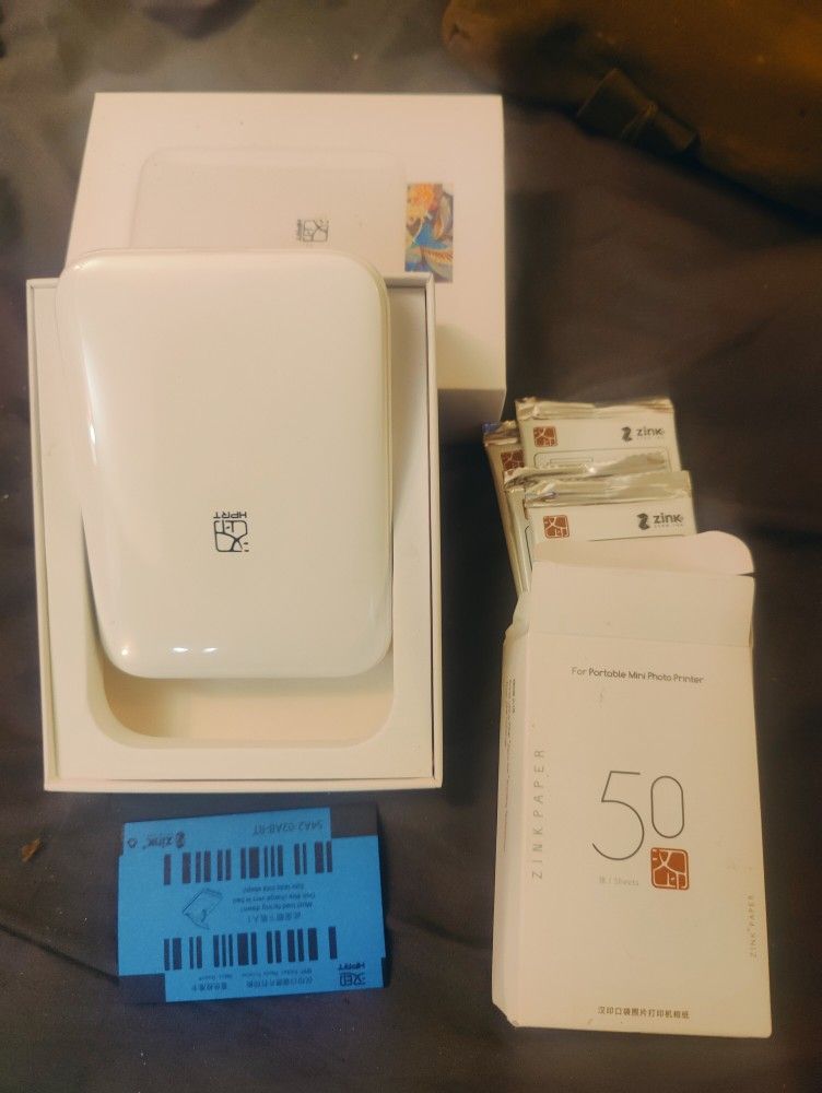 ZINK MINI THERMAL HAND HELD COLOR PRINTER And 5 PACKS OF PHOTO PAPER