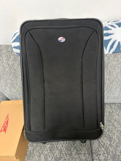 American Tourist luggage with shoulder bag