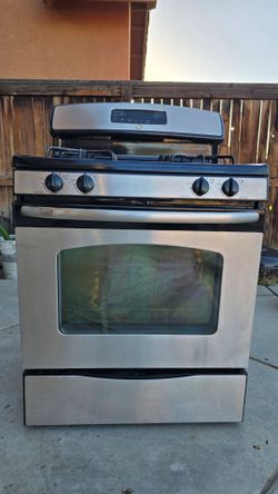 Kitchen stove, GE, silver and black color