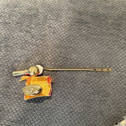 Polished brass toilet tank trip lever and brass angle stop