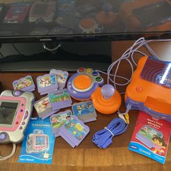 Vtech https://offerup.com/redirect/?o=Vi5TbWlsZQ== Learning System Console Bundle 2 Games And Joystick And Pocket Pal
