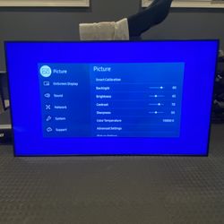 Samsung QBC Series 75" UHD 4K HDR TV with Adjustable Stand, Power Cords, and Remote