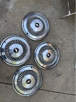 1977 Chevy Impala, 15 inch hubcaps