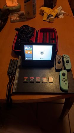 Nintendo Switch V2 Bundle + 5 Games + 3 Joy-Cons – $350 OBO