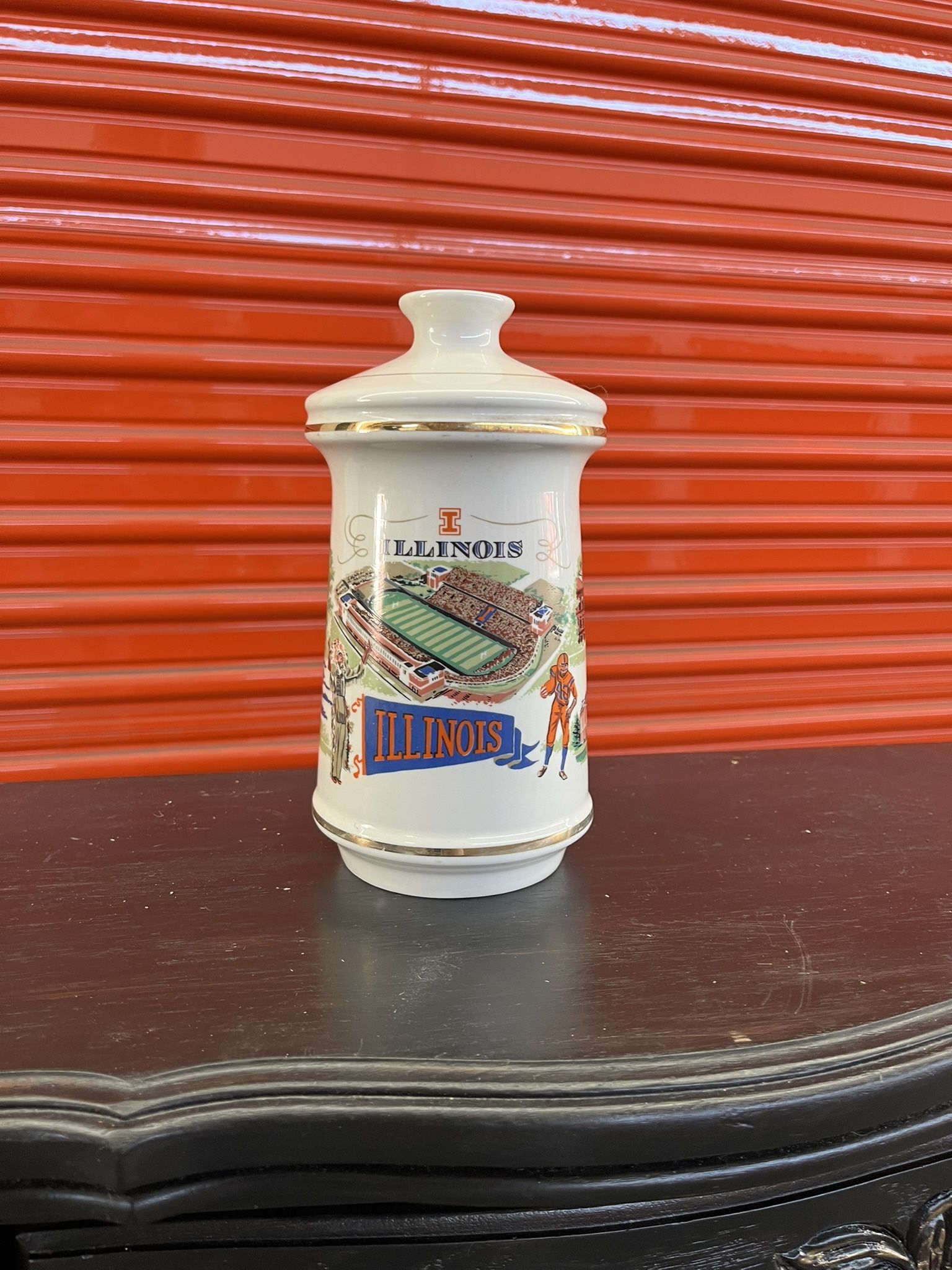 Vintage 1972 University Of Illinois Old Fitzgerald Whiskey Decanter is a unique and collectible piece of distillery memorabilia.