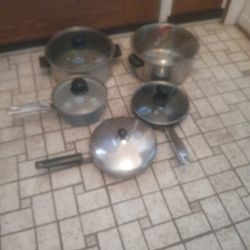 Five Pots And Pans With Lids For One Low Price 
