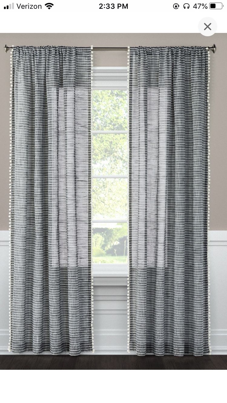 Two dark gray striped curtain panels with pompoms Threshold