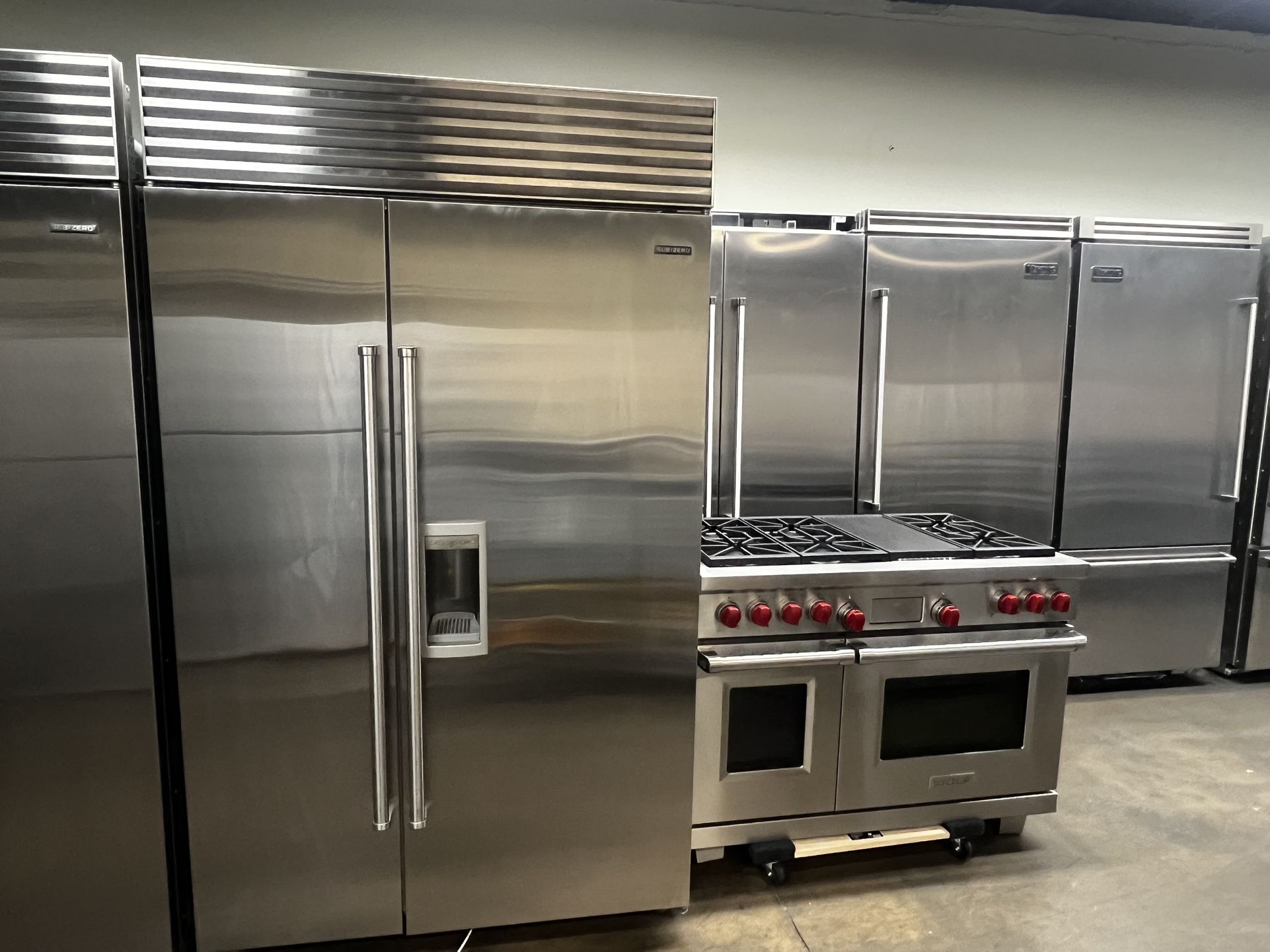 Wolf 48”Wide Dual Fuel Range Stove And Sub Zero 48”Wide Built In Refrigerator