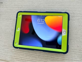 iPad Air 2 with case and charging cable