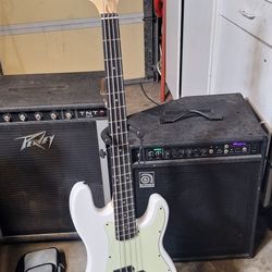 1 Bass Guitar With 2 Bass Amps
