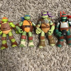 Lot of 4 Flingers Nickelodeon Teenage Mutant Ninja Turtles with Weapons 2012