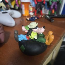 1995 Burger King Kids Meal toy featuring Goofy and Max in an inner tube