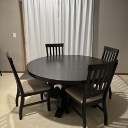 60” Round Table & Four Chairs