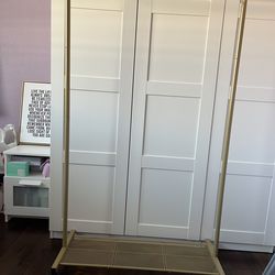 Gold clothing rack