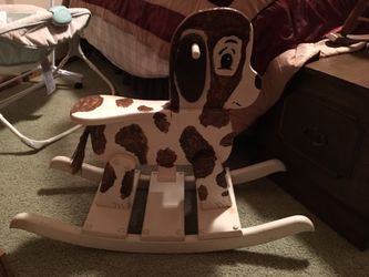 Solid very sturdy rocking dog $10