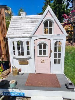 Cute children's backyard playhouse-Cedar