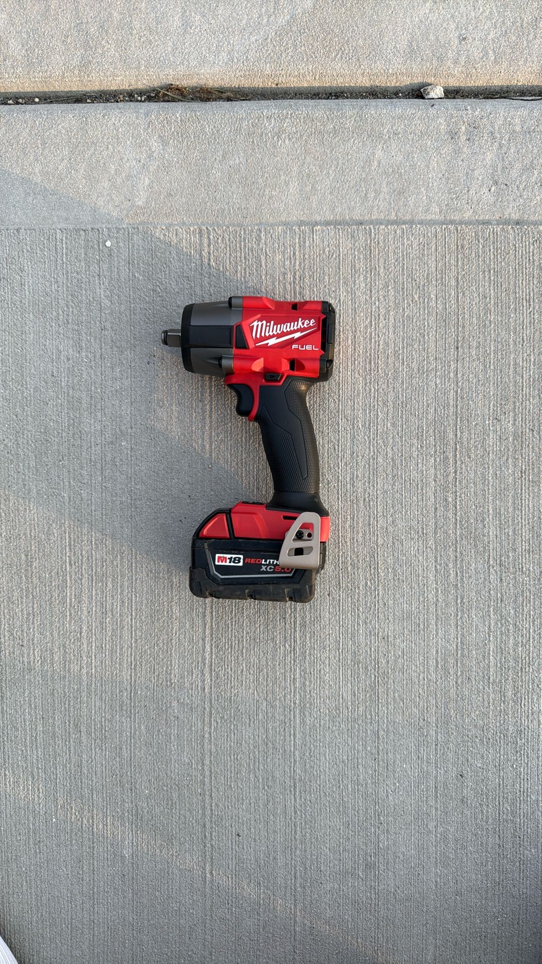 Milwaukee M18 FUEL Gen-2 18V Lithium-Ion Brushless Cordless Mid Torque 1/2 in. Impact Wrench w/Friction Ring with battery 5.0 AH