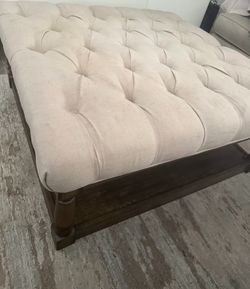 Solid Wood Ottoman with fabric top. 40x40 by 17 inch tall