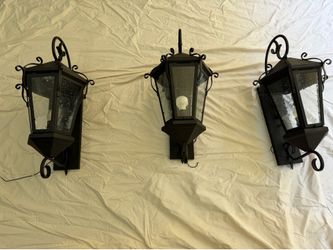Three carriage lights