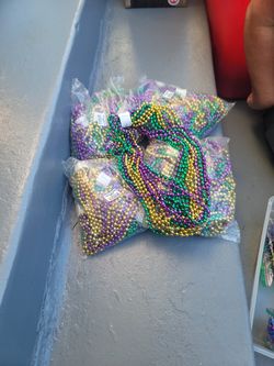 18 Dozen Mardi Gras Beads $65