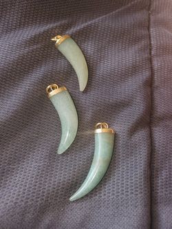 Jade horn shaped pendant 20$ each