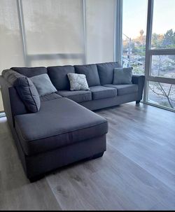 Beautiful Dark Grey Sectional couch from Living Spaces LIKE NEW!!