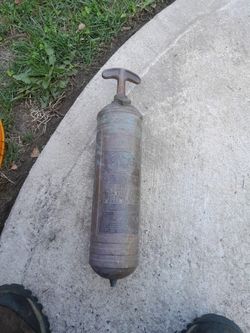 An Old Pump Fire Extinguisher Copper