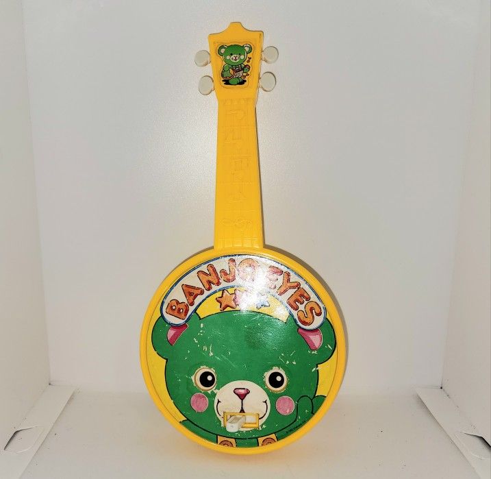 Vintage 1982 Shelcore Banjo Eyes musical toy banjo in working condition