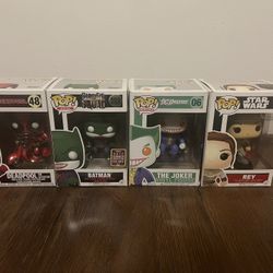 4 Funko Pop! Bobble Heads.