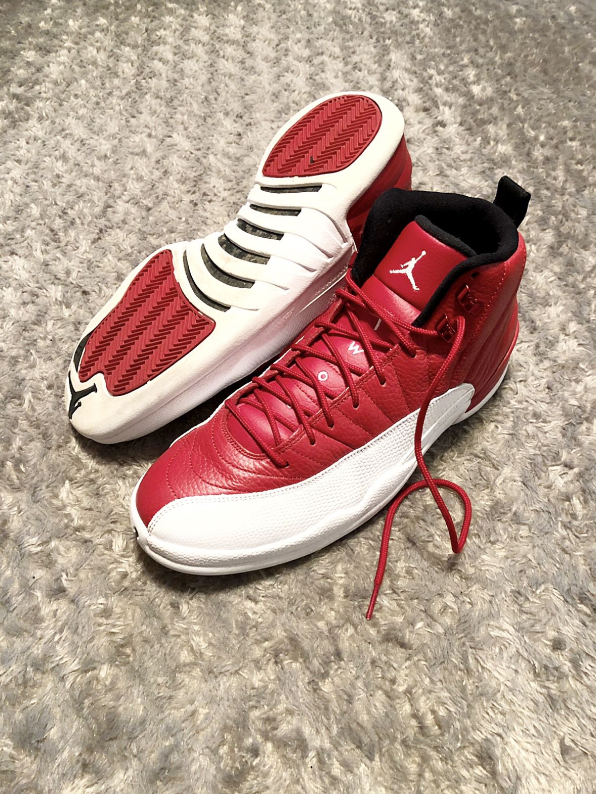 Mens Air jordan 12 Retro Size 11 comes with box. 1000% authentic! Color red & white. Minor creasing on the front other then that excellent condition!