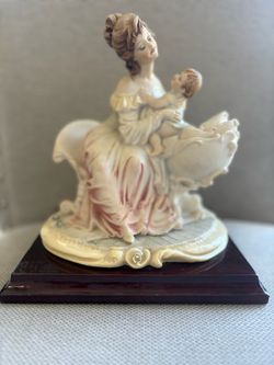Porcelain Mother and Child Figurine on Wood Base