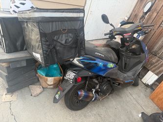 2 mopid scooters