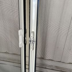Hermosa puerta retractable doble NUEVA MIDE 72" de larga x 80" de alta  NUEVA Y BARATÍSIMA $170   me queda 1 apártela 