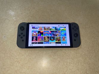 NINTENDO SWITCH OLED + 100 POPULAR GAMES