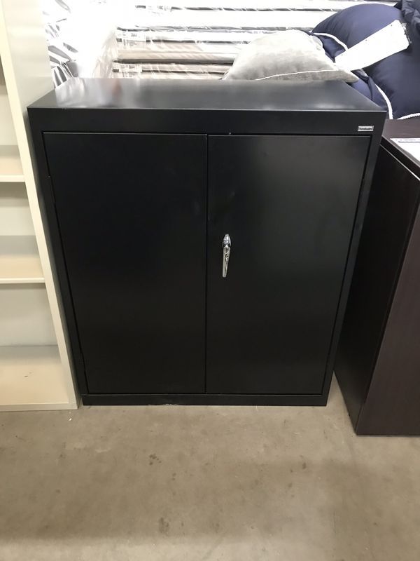 Metal locking storage cabinet