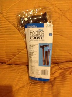 Folding adjustable cane